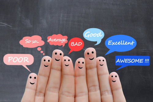 Customer satisfaction scale and testimonials concept with human fingers