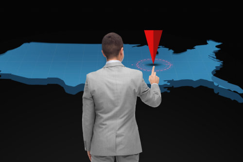 businessman with virtual usa map and pointer